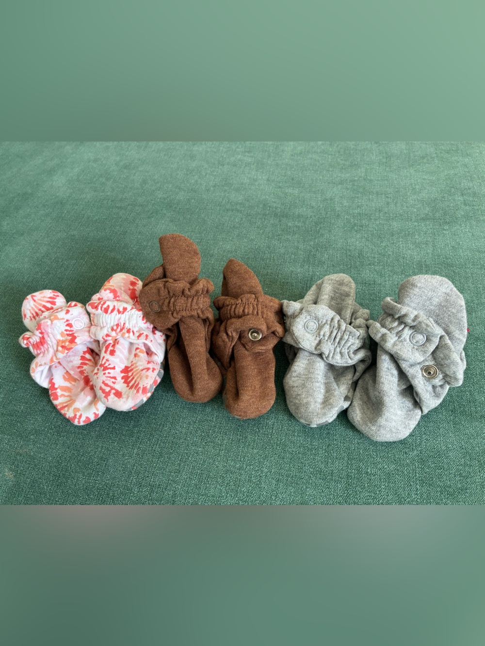 3 pairs of Zutano 0-3 month cotton infant booties (pink tie dye, brown, gray)